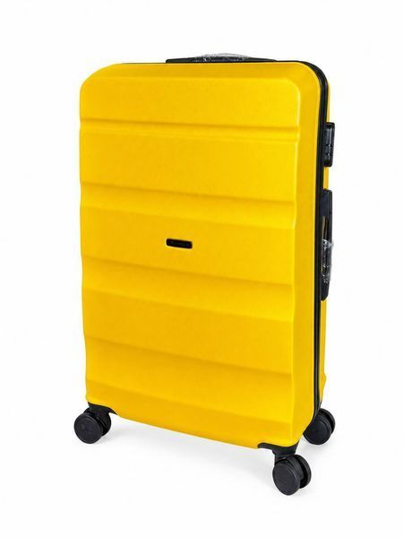 Велика дорожня пластикова валіза WINGS LOVEBIRD AT01 L 28" Жовтий AT01 L Yellow фото